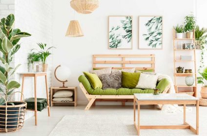 A living room with two pictures on the wall
