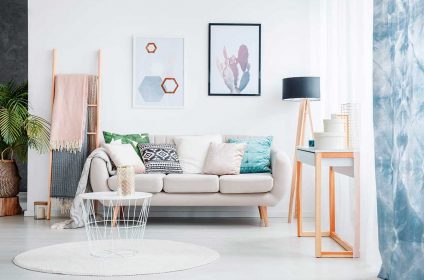 A living room with white walls and furniture.