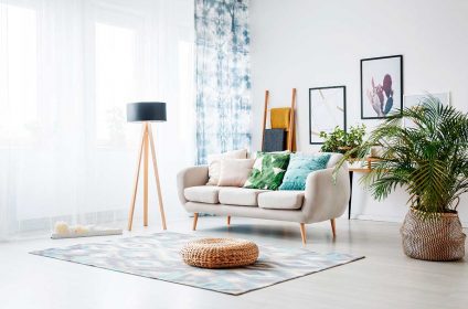A living room with a couch and chair